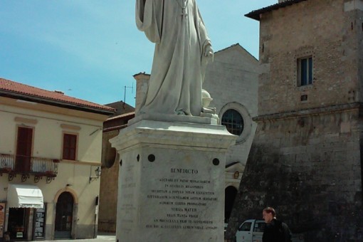 St. Benedict statue outside Monastery church in Norcia