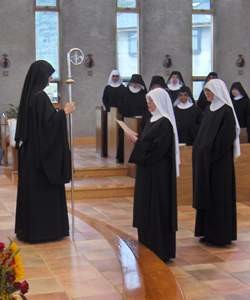 A profession at St. Walburga's Abbey. Note the abbess's crosier.