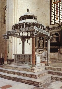 The altar of St. Nicholas's Basilica in Bari, Italy. Note the three steps. This graded platform is known as the predella.