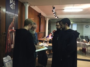 Br. Gabriel, Vladislav, and Br. Timothy in discussion after lecture