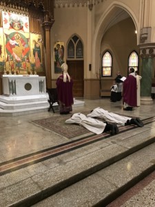 Br. Gabriel and Br. Joseph prostrate themselves during the Litany of the Saints.