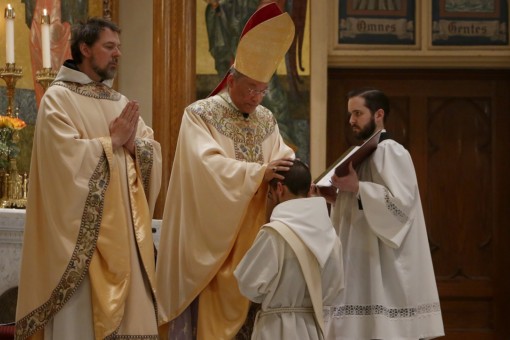 Bishop Perry confers the sacrament of Holy Orders.